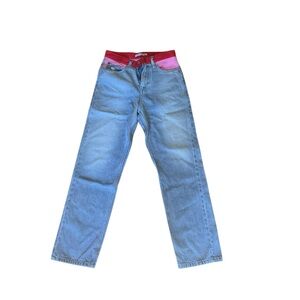Stylish Blue Calvin Klein Jeans with Red and Pink Accents